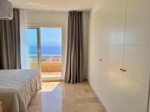 Postel nebo postele na pokoji v ubytování Townhouse with Ocean View + 16 fotografií