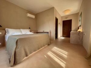 a bedroom with a bed in a room at Medina in Skala