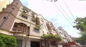 a large building with balconies on the side of it at Nest-In Homes in Hyderabad