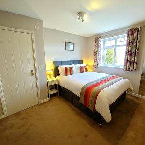 Ένα ή περισσότερα κρεβάτια σε δωμάτιο στο Brightwire 2bedroom apartment Eastleigh