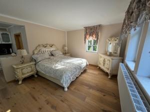 Postel nebo postele na pokoji v ubytování Zum Böhmen Ferienwohnung Elisabeth