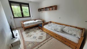 Ένα ή περισσότερα κρεβάτια σε δωμάτιο στο Bright & Cozy Apartment in Mainaschaff