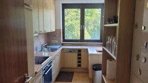 Η κουζίνα ή μικρή κουζίνα στο Bright & Cozy Apartment in Mainaschaff