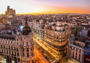 an aerial view of a city at night at Luminoso cerca 4 Caminos- Apartamento REINA VICTORIA in Madrid