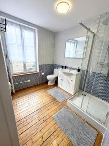 a bathroom with a shower and a sink and a toilet at Chez Gabin in Carentan +15 photos