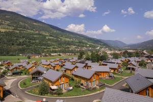 an aerial view of a small village with houses at Kreischberg Chalets by ALPS RESORTS in Sankt Lorenzen ob Murau