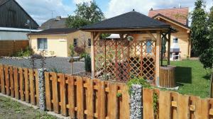 Ein Garten an der Unterkunft Spreewaldhäuser Wiesner
