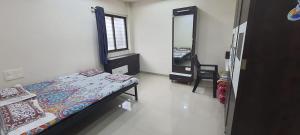 Ένα ή περισσότερα κρεβάτια σε δωμάτιο στο The Nest - Riverside