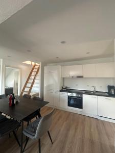 Kuchyň nebo kuchyňský kout v ubytování MAC Apartment nähe Legoland