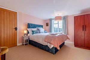 Voodi või voodid majutusasutuse Chapel Cottage - Nacton toas