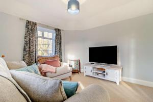 Televiisor ja/või meelelahutuskeskus majutusasutuses Chapel Cottage - Nacton