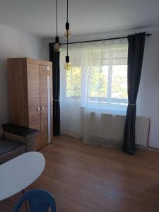 Posezení v ubytování Garsonieră Luduș