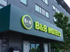a building with a sign for a bbc hotel at B&B HOTEL Birmingham Centre in Birmingham