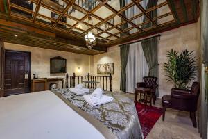 Voodi või voodid majutusasutuse Sobek Palace toas