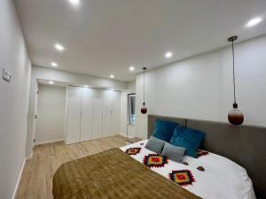 Ένα ή περισσότερα κρεβάτια σε δωμάτιο στο Sunny House