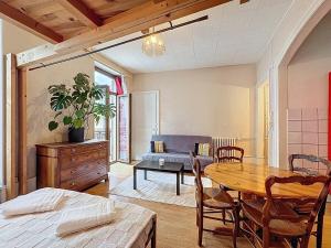 En eller flere senge i et værelse på Charmant studio centre ville d'Aix-les-bains