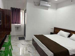 Postel nebo postele na pokoji v ubytování Hotel Royal Park Inn