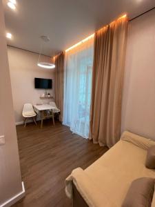 Televisyen dan/atau pusat hiburan di ЖК Dostar Modern Comfort