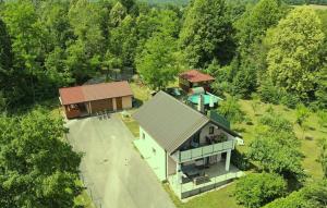 an overhead view of a house in the woods at House Kiki by Villas Guide in Bosiljevo