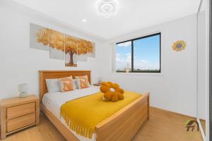 Fairfield Convenient City View 2 Bedroom Apartmentにあるベッド
