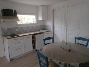 Η κουζίνα ή μικρή κουζίνα στο Le chalet d'Opale +4 φωτογραφίες
