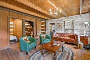 a living room with a couch and two chairs and a table at Historic 1802 Forge Home by North River & Trails in Capon Bridge +53 photos