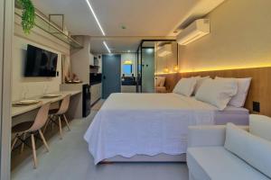 Televisyen dan/atau pusat hiburan di Flat pé na areia Get Sense - MyFlats Hospedagens