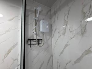 Ένα μπάνιο στο Cosy Ensuite Room