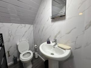 Ένα μπάνιο στο Cosy Ensuite Room