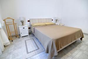 Postel nebo postele na pokoji v ubytování Affittacamere A Pochi Passi