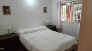 Ένα ή περισσότερα κρεβάτια σε δωμάτιο στο Casas Lotes y Sierras