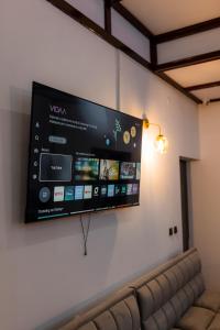 TV a/nebo společenská místnost v ubytování BAVA Hotel
