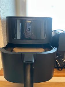 a computer monitor with a person taking a picture at Fe Wo auf der Alb in Wittlingen