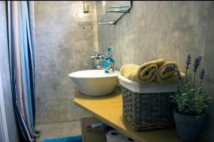 a bathroom with a sink and a sink at Grandmas Mansion 3BD Meteora - Rocks View in Kalabaka