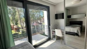 Ένα ή περισσότερα κρεβάτια σε δωμάτιο στο BEACH Apartament Pobierowo +15 φωτογραφίες