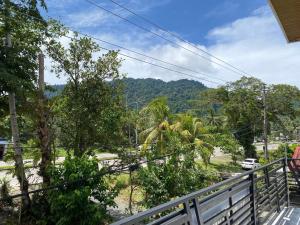a balcony with a view of a mountain at Baldonado Transient Homestay in San Isidro