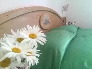 Voodi või voodid majutusasutuse Hotel Tosa toas