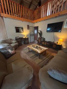 TV a/nebo společenská místnost v ubytování Kudu's Corner + 29 fotografií
