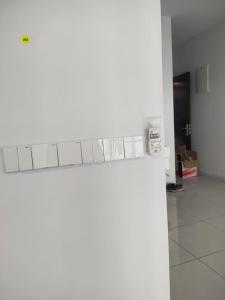 a kitchen with a white counter top in a room at The Valley, SkySierra KL in Kuala Lumpur