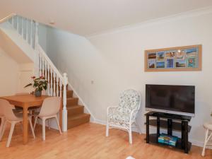 TV a/nebo společenská místnost v ubytování Acorns