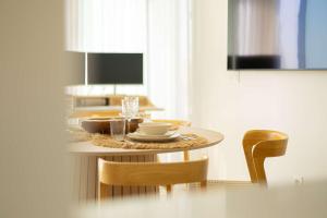 Posezení v ubytování One Residences - 2 bedroom penthouse with jacuzzi and panoramic view