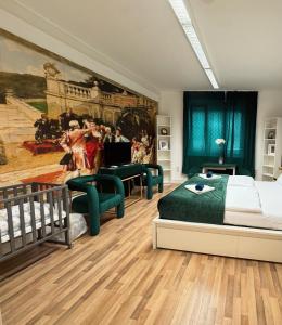 a bedroom with a bed and a painting on the wall at Royal Apartment Vienna in Vienna