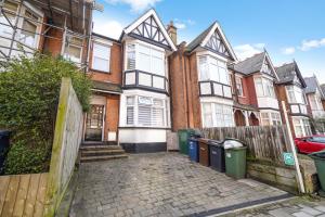 an empty street in front of a house at Central Harrow Studios 3mins to station! in Harrow