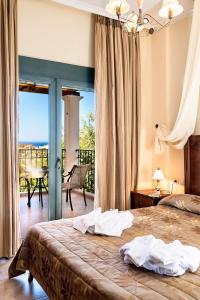 เตียงในห้องที่ Villa Vallia - Villa Marina