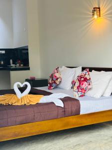 Кровать или кровати в номере Revival Beach Resort