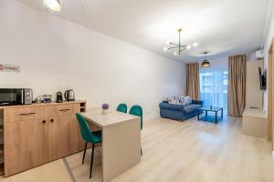 Kuchyň nebo kuchyňský kout v ubytování B-House Adora Park