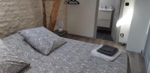 Katil atau katil-katil dalam bilik di Chambre dans gîte