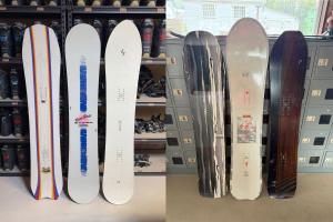 Un grupo de tablas de snowboard alineadas en un estante en lodge EDMONTON, en Yuzawa