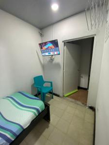 TV a/nebo společenská místnost v ubytování Hostal Ferdiz + 6 fotografií