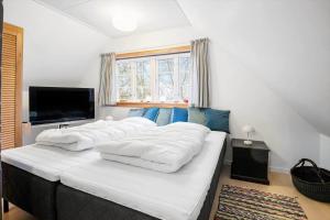 Ένα ή περισσότερα κρεβάτια σε δωμάτιο στο 4747-Aakirkeby-Bodernevej-10 +28 φωτογραφίες